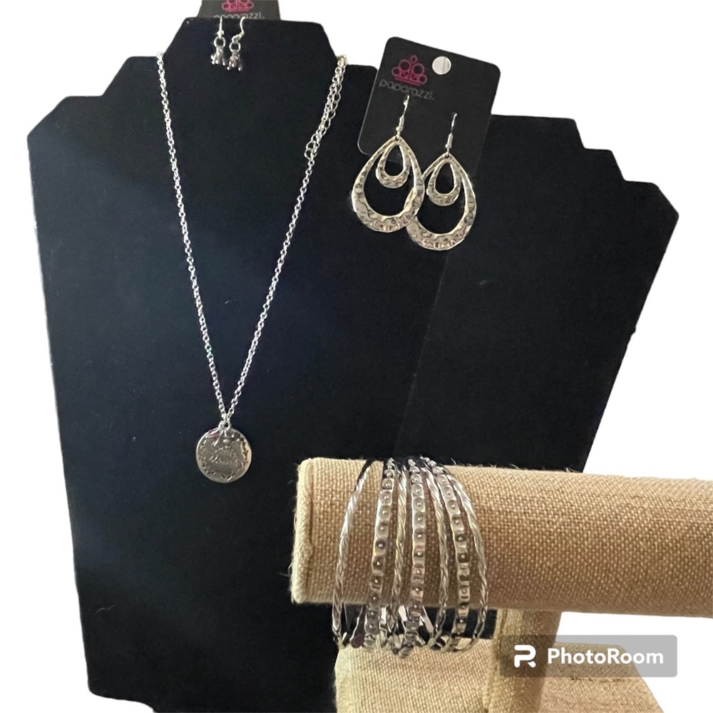Necklace, bracelet, earrings.